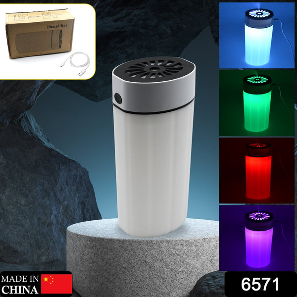 Small humidifier with vibrant light effect, designed for car or desk.