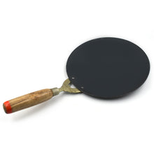 Wooden handle nonstick roti tawa for easy and efficient cooking in the kitchen.