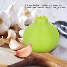 Simple silicone tool for peeling garlic and ginger.