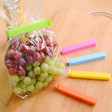 Easy-to-use sealing clips for closing food bags and preventing spoilage.